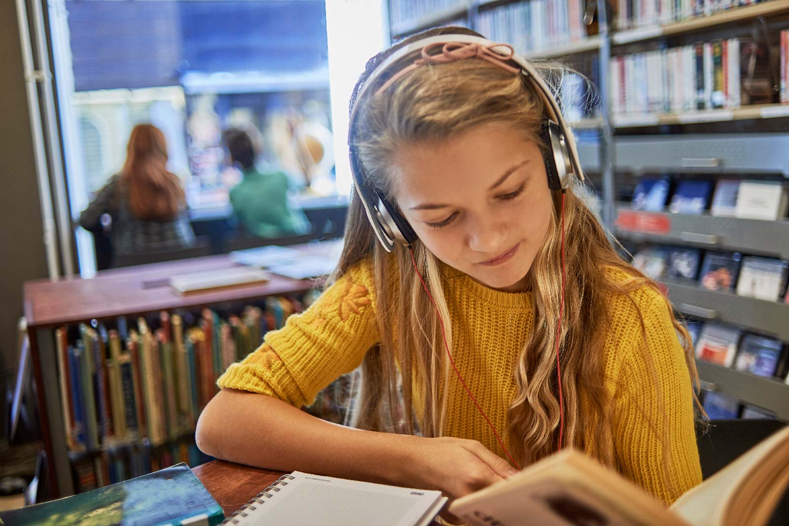 Girl listening to an audio book